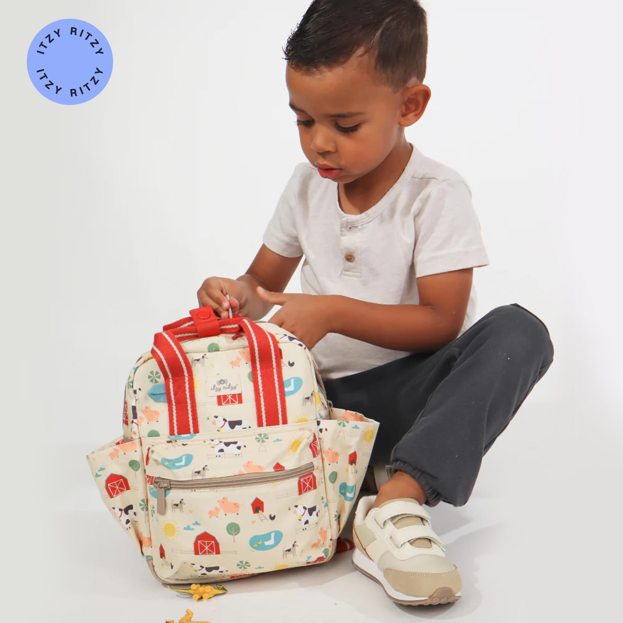 イッチx Childrenof thediscordanceSLING BAG Amazon.com: Itzy Ritzy Chelsea + Cole Mini Diaper Bag